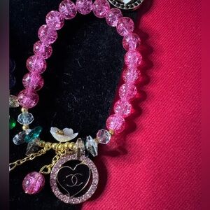 Zipper pull on Elegant Pink Beaded Bracelet with Gold Accents